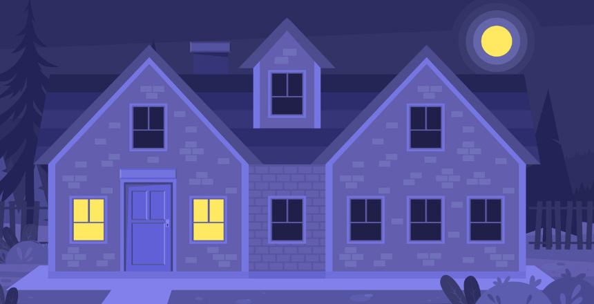 House with darkened windows and two lighted rooms