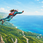 Illustrated wide-format scene of a woman launching from a wooden platform on a rocky cliff, soaring over a lush green coastline and vivid blue ocean while wearing a teal jumpsuit, white helmet, and orange backpack.